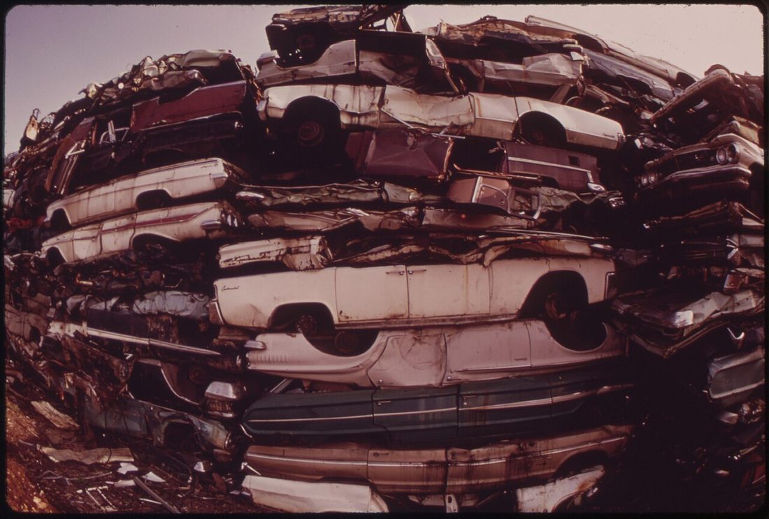 Vehicle scrap stacked for clearance
